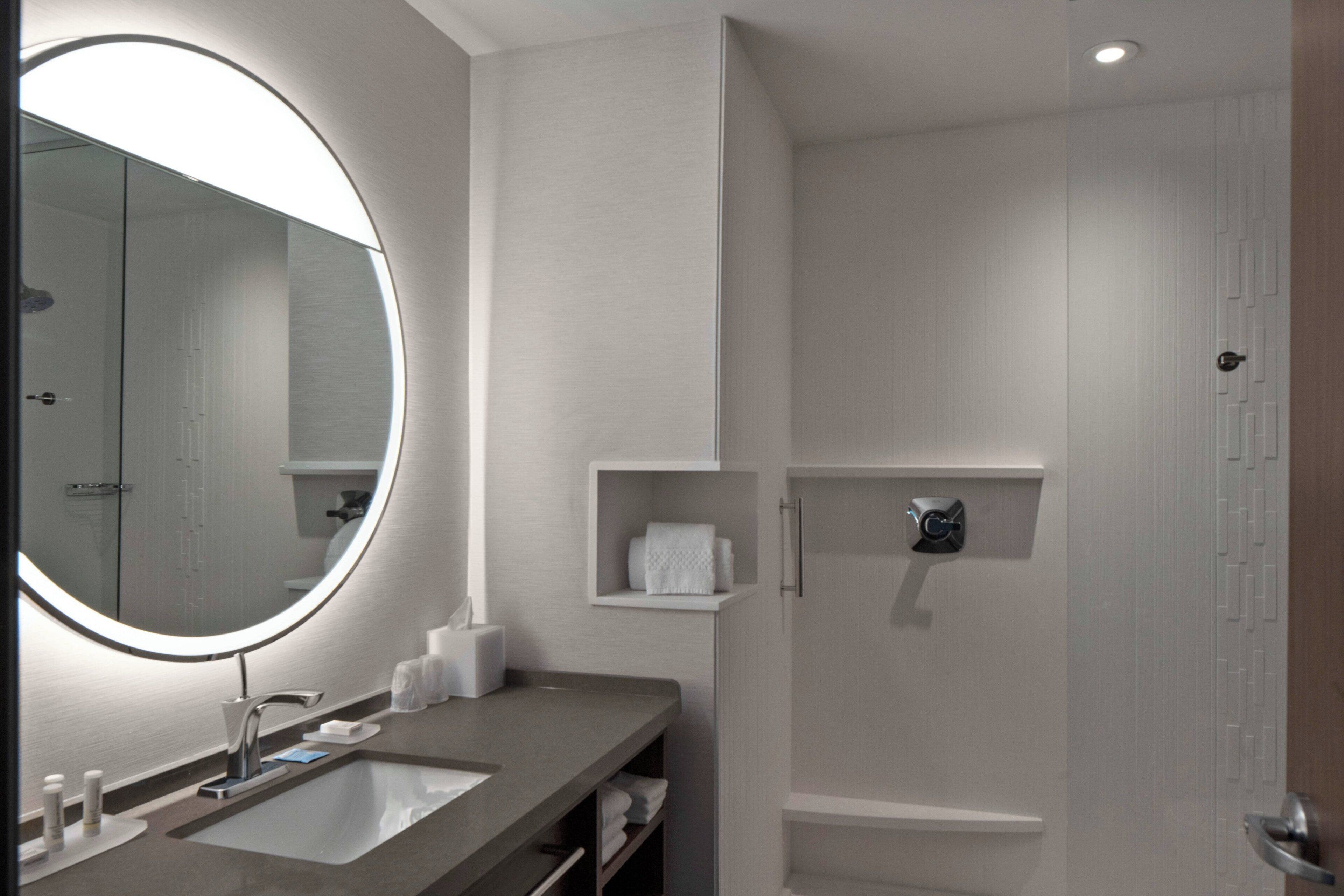 combined shower/bathtub, hair dryer, towels, soap