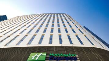 A tall building with a Holiday Inn Express sign at the bottom.