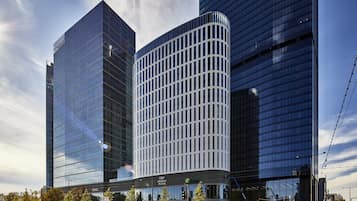 Situated in the heart of the city, this building offers a sleek, contemporary appearance with a distinctive curved facade.