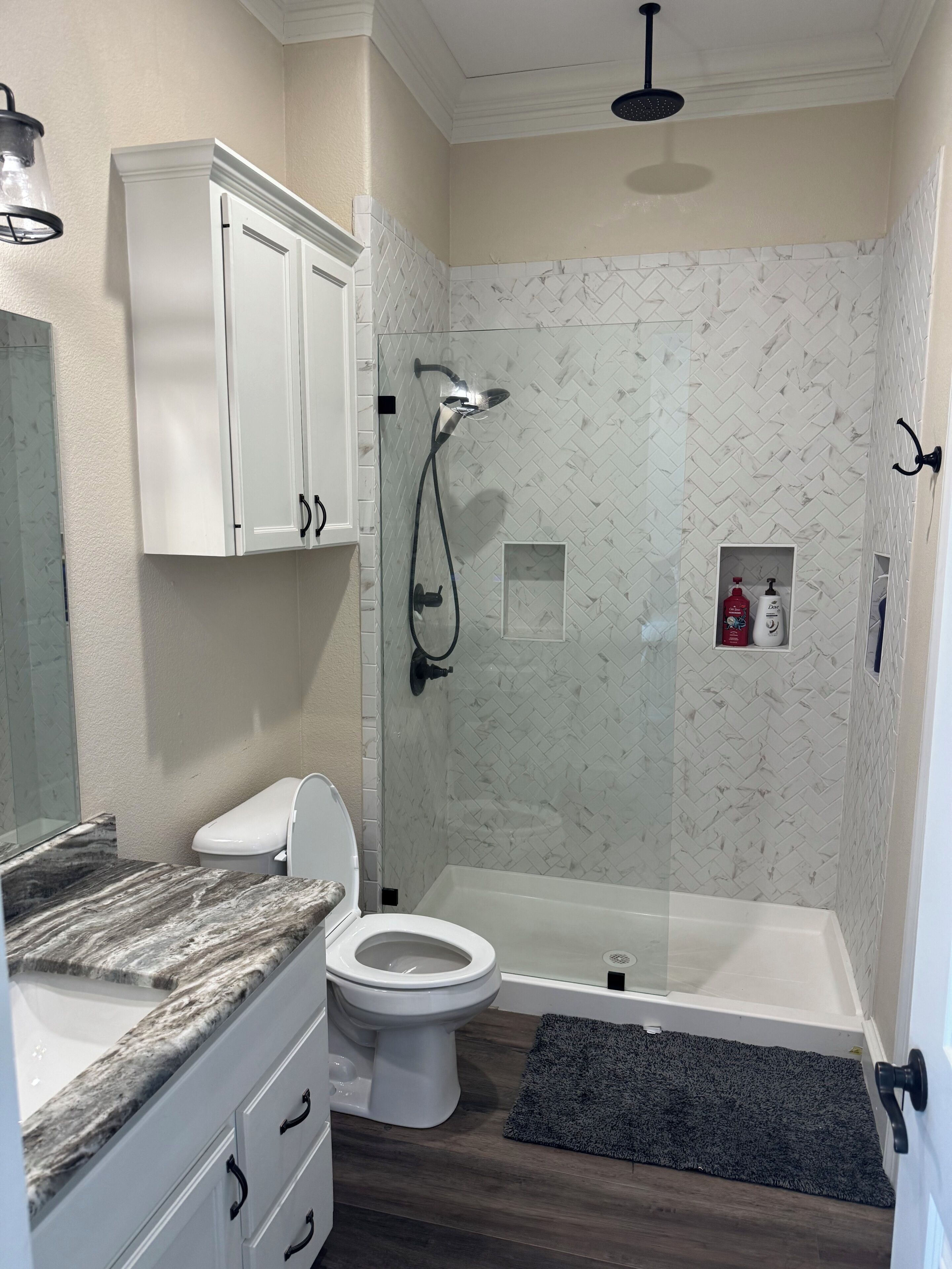 Shower, towels, soap, toilet paper