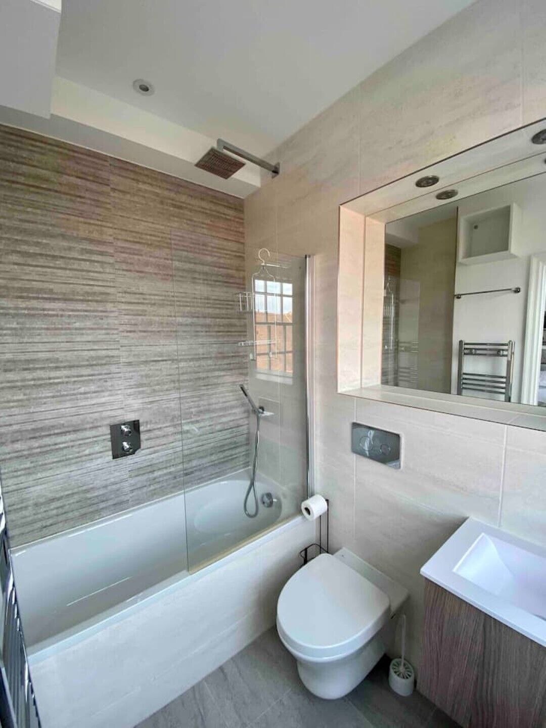 Combined shower/tub, hair dryer, towels, soap