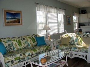 Condo, 1 Bedroom, Golf View | Living room | Flat-screen TV - The Champions at Sea Trail Condos by Sloane Realty Vacations (Sunset Beach)