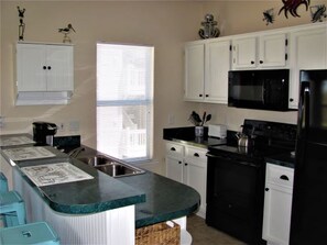 Villa, 2 Bedrooms, Golf View | Private kitchen | Fridge, microwave - River Creek II at Sea Trail by Sloane Realty Vacations (Sunset Beach)