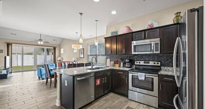 SAY HI to this Dog Friendly 3 Bedroom Home - Walk to the Beach