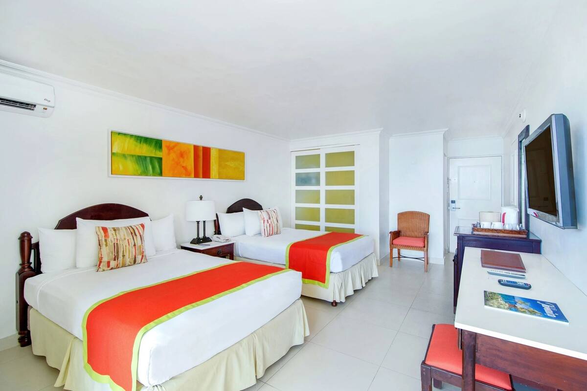 Ropa de cama de alta calidad y camas con pillow-top 