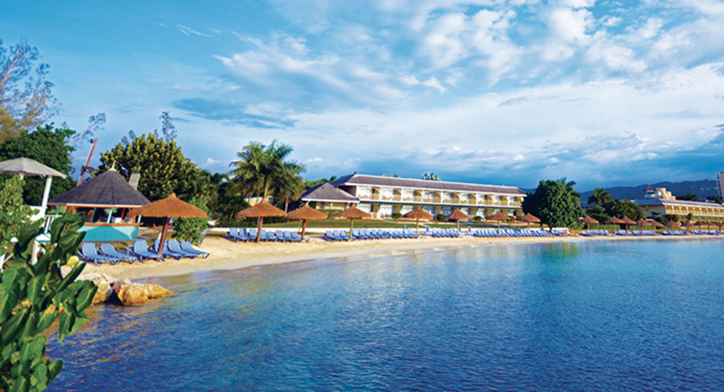 Private beach, white sand, sun loungers, beach umbrellas