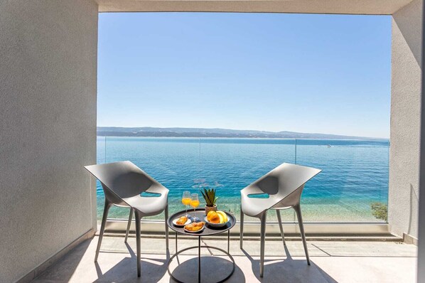 Deluxe Room, Balcony, Sea View (for 4) | Terrace/patio