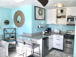 Microwave, coffee/tea maker, cookware/dishes/utensils