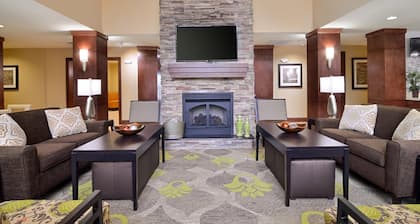Queen Suite in Tomball | Shared Outdoor Pool + 24h Fitness Center
