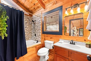 Combined shower/bathtub, jetted bath, hair dryer, towels - Fairy Tale Cabin | Pool | Hot Tub | King Beds (Gatlinburg)