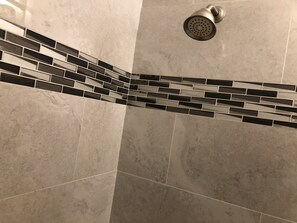 Combined shower/tub, hair dryer, towels, soap
