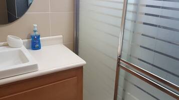 Shower, towels, soap, shampoo