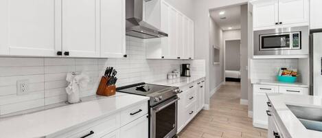 Fridge, microwave, dishwasher, coffee/tea maker