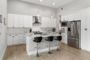 Fridge, microwave, dishwasher, coffee/tea maker