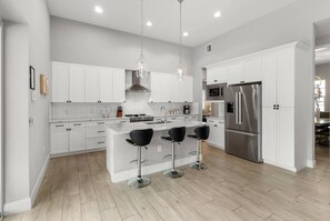 Fridge, microwave, dishwasher, coffee/tea maker