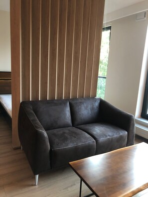 Exclusive Studio Suite | Living area | Flat-screen TV - Apartament Dzielna 64 (Warsaw)