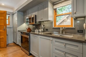 Fridge, microwave, oven, stovetop - Close to Homestead Resort! Filtered Lake Views! (Homewood)