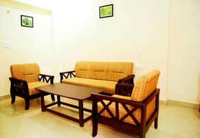 Premier Room, Valley View | Living area | 30-inch LED TV with satellite channels, TV