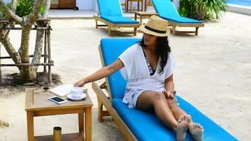 Private beach, sun-loungers, beach towels, beach massages