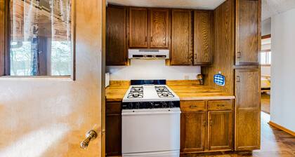 Quiet lakefront home with dock, canoe, & sunroom - dog-friendly