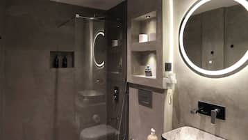 Shower, free toiletries, hair dryer, towels