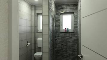 Hair dryer, towels, soap, shampoo