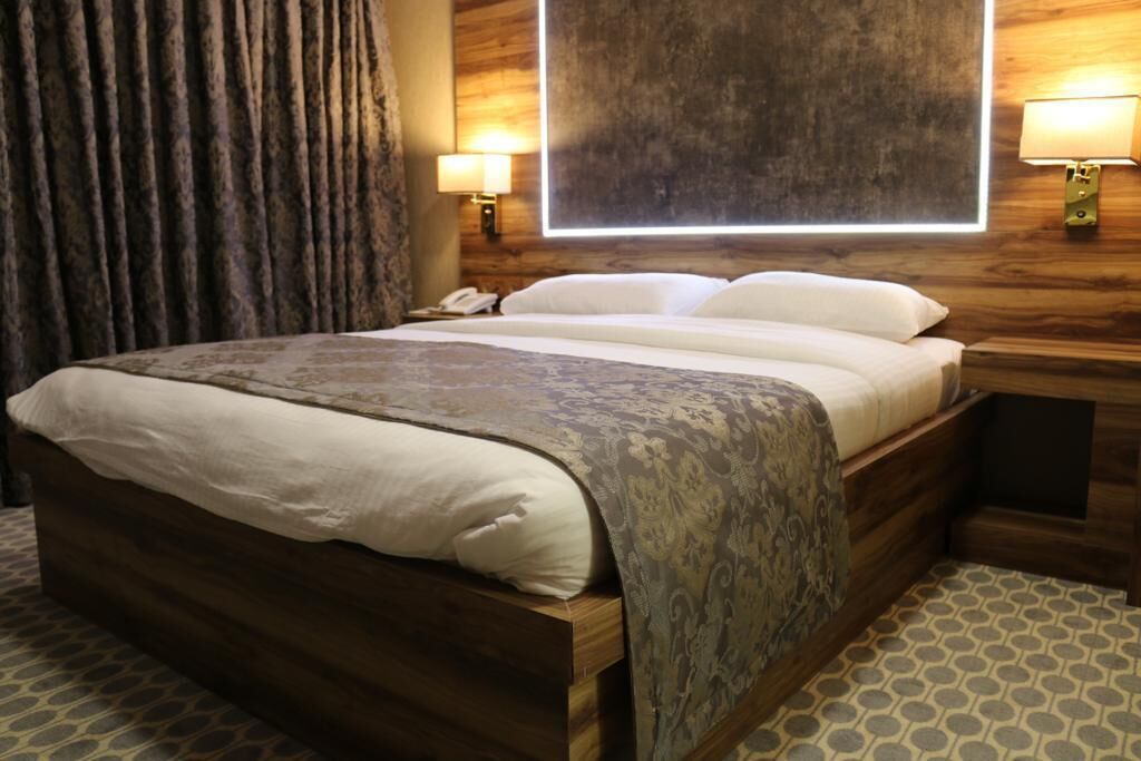 Chambre Confort | Literie de qualité supérieure, couette en duvet d'oie
