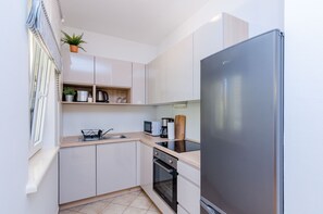 Fridge, microwave, oven, stovetop - Private Garden Apartment Dubrovnik - Two-Bedroom Apartment with Garden and Terrace (Dubrovnik)