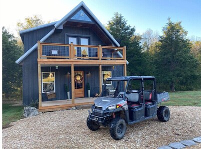 Unique,modern, secluded cabin on 95 river front acres-utv-kayaks-trails-hot tub