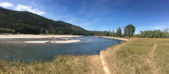 Ranch-style home with horse property and fenced yard