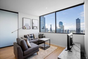 Apartment (2 Bedrooms) | Living room | TV - Cozy APT Seaview Next to Southern Cross/pool/gym (Melbourne)