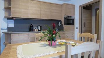 Apartment, 1 Bedroom (Caterina) | Private kitchen | Full-size fridge, microwave, oven, stovetop