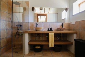 Shower, hair dryer, towels, toilet paper