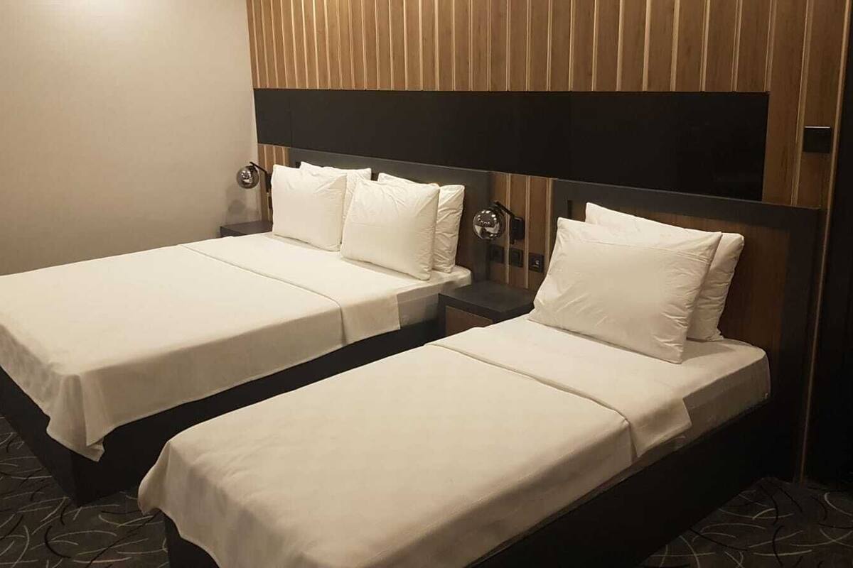 family room | egyptian cotton sheets, premium bedding, desk, laptop workspace