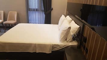 Egyptian cotton sheets, premium bedding, desk, laptop workspace