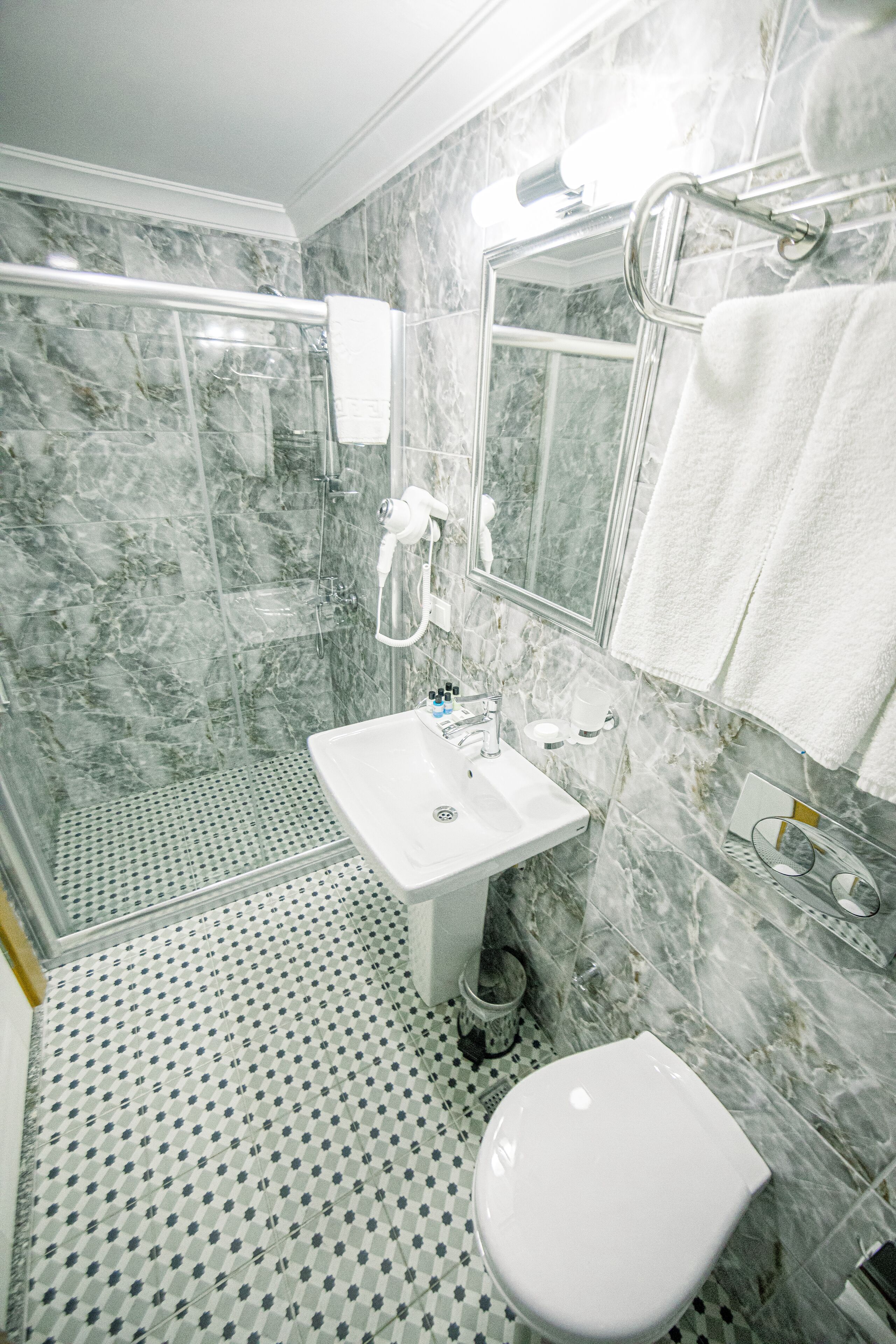 shower, free toiletries, hair dryer, slippers