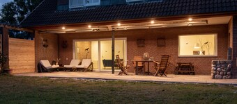 Spacious vacation apartment with garden, surrounded by greenery.