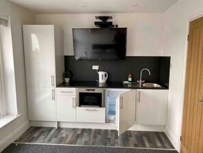 Fridge, microwave, coffee/tea maker, electric kettle