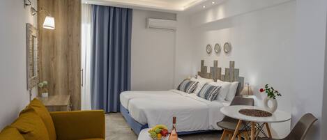 Estudio de lujo | Área de sala de estar | Televisión de pantalla plana y reproductor de DVD