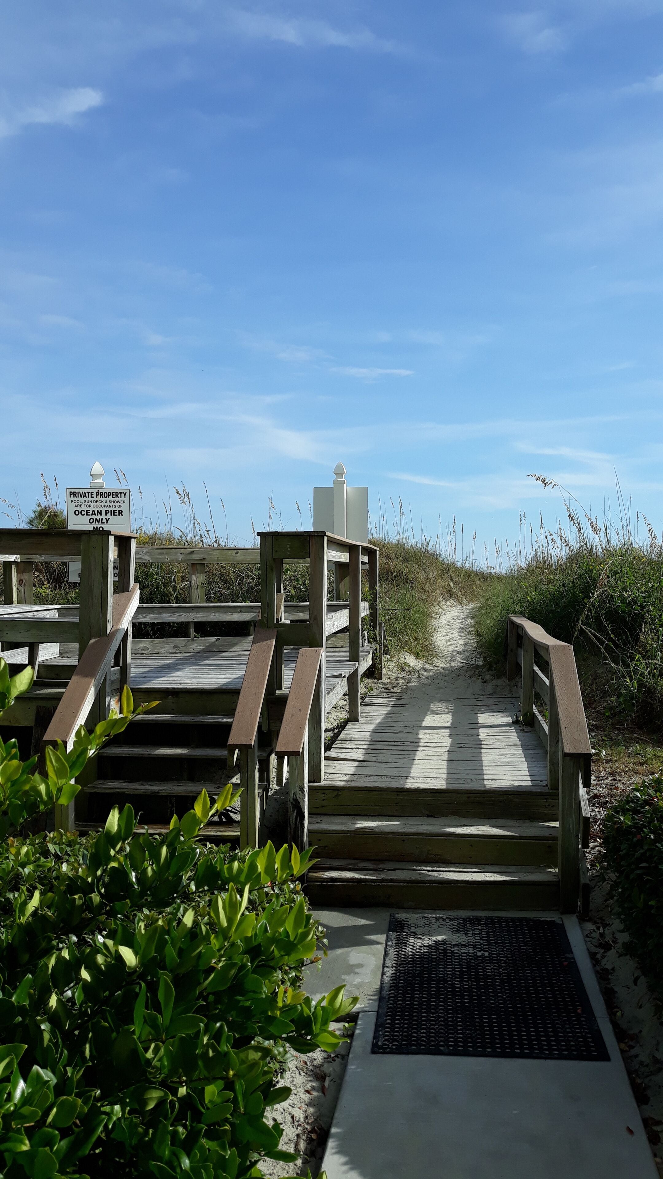 
Easy beach access with bench to just sit and view that gorgeous ocean.  