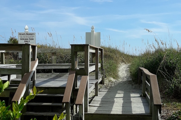 Easy beach access with bench to just sit and view that gorgeous ocean.