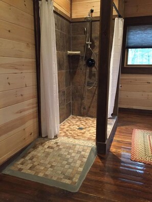 Bathtub, hair dryer, towels, soap