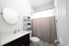 Combined shower/bathtub, hair dryer, towels, soap - New house on the block (Miami)