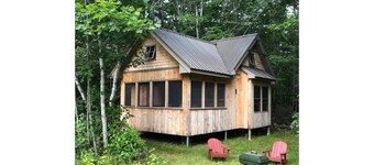 An off-grid comfy cabin in a quiet corner of a midcoast organic farm