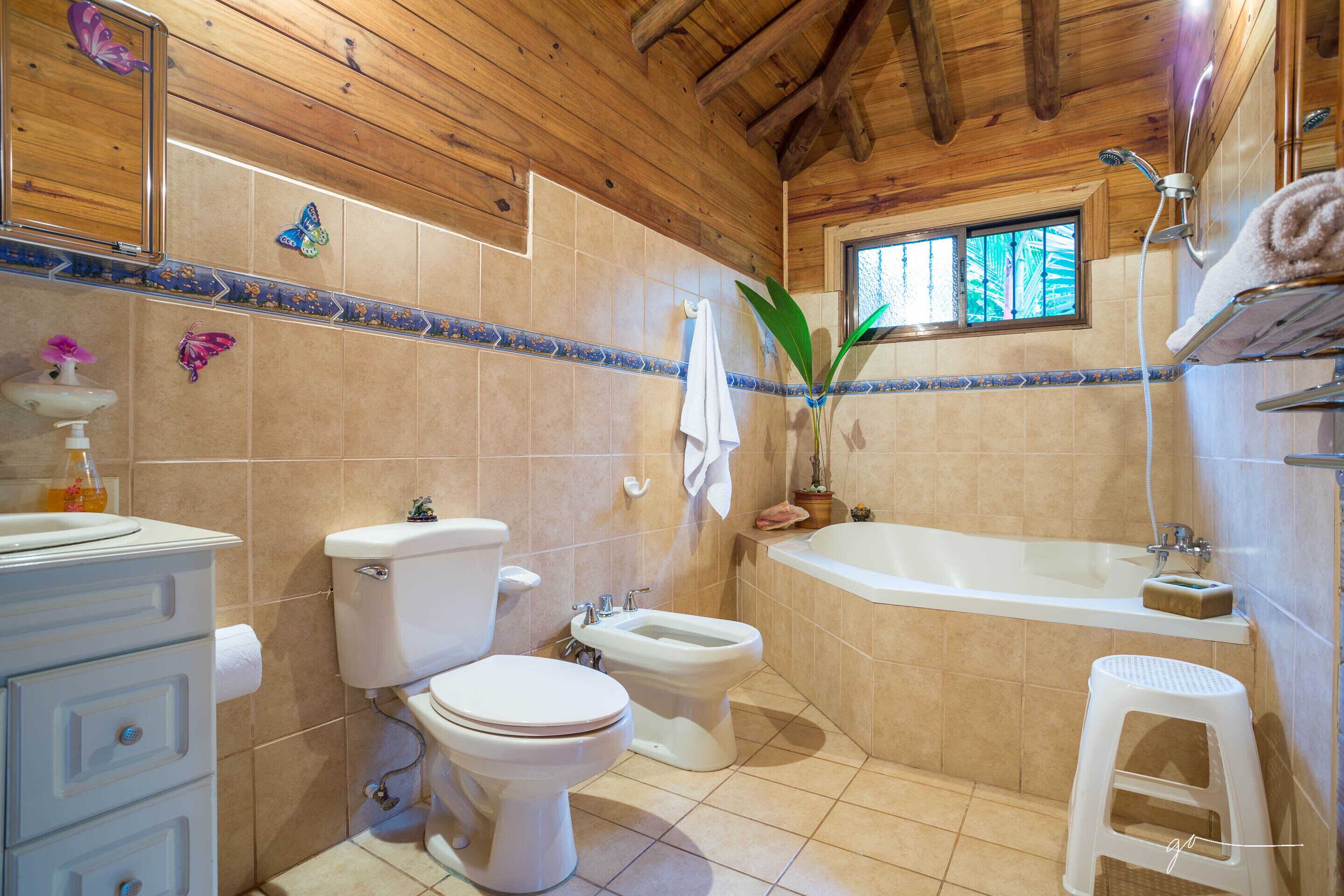Deluxe Cabin, Terrace, Garden Area | Bathroom | Combined shower/tub, hair dryer, bidet, towels