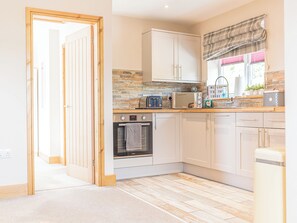 Astianpesukone, syöttötuoli