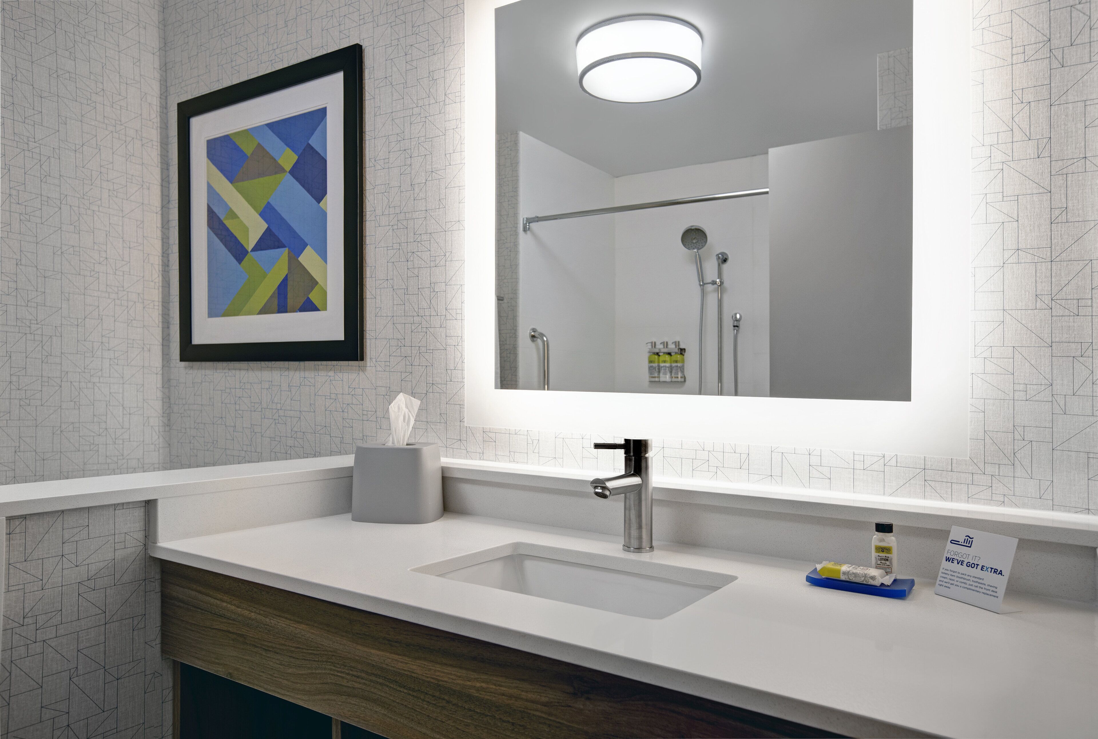 combined shower/bathtub, hair dryer, towels, soap