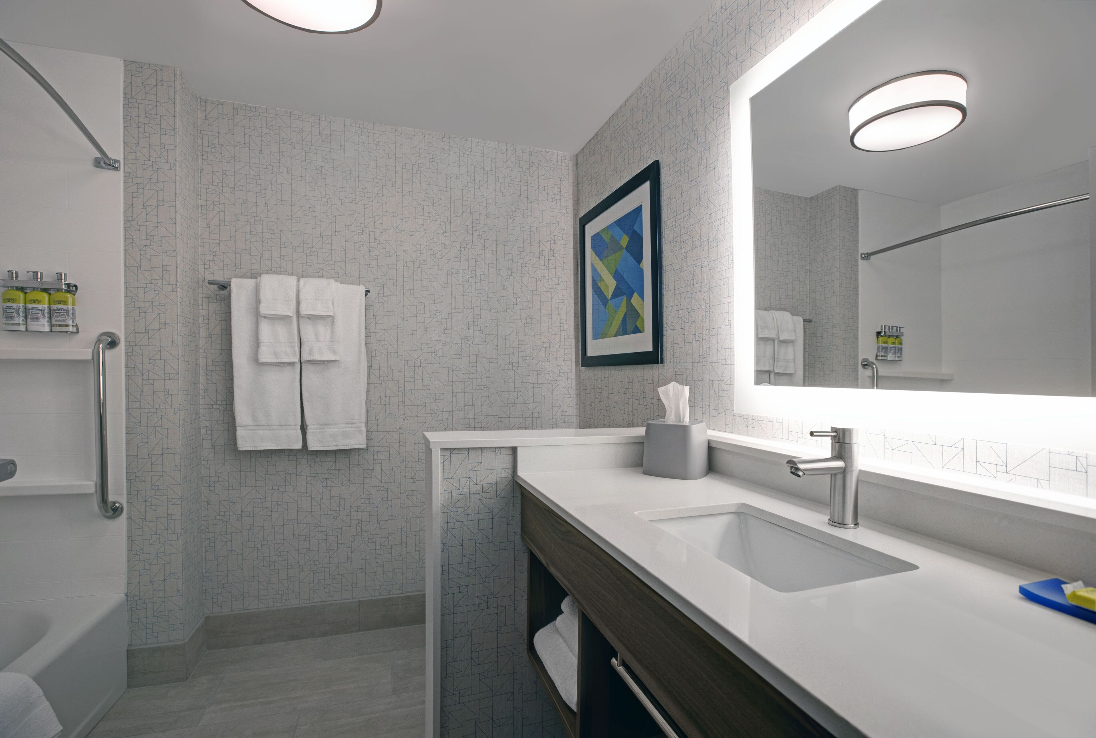 suite, 1 king bed | bathroom | combined shower/bathtub, hair dryer, towels, soap
