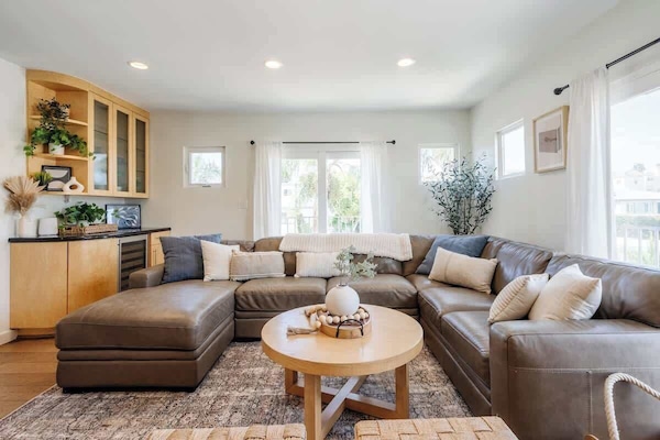 Relax and unwind in the bright, sun-filled living space