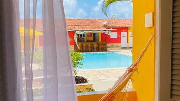 Family Room, Garden View | Minibar, individually decorated, individually furnished